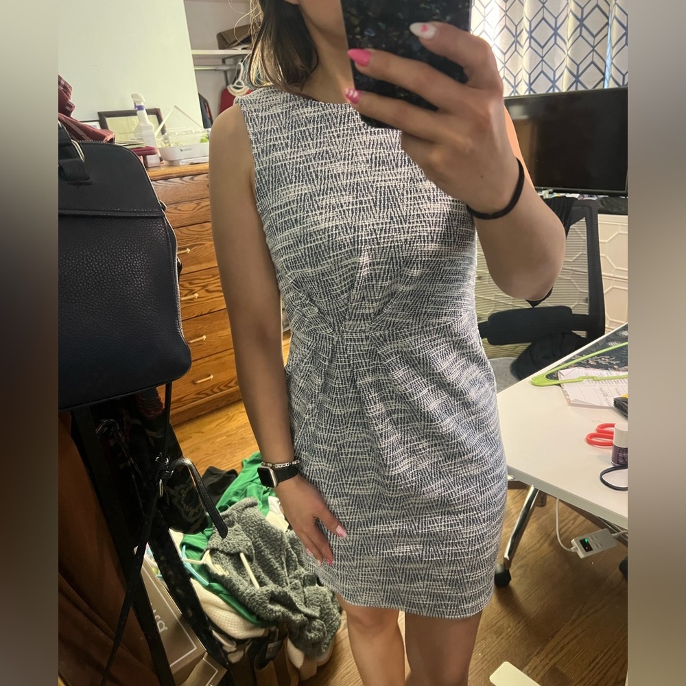 Great dress for work. Worn only a few times. Smokeless household.